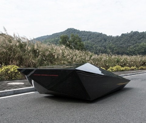 Square glass supercar that reminds a fighter jet stealth